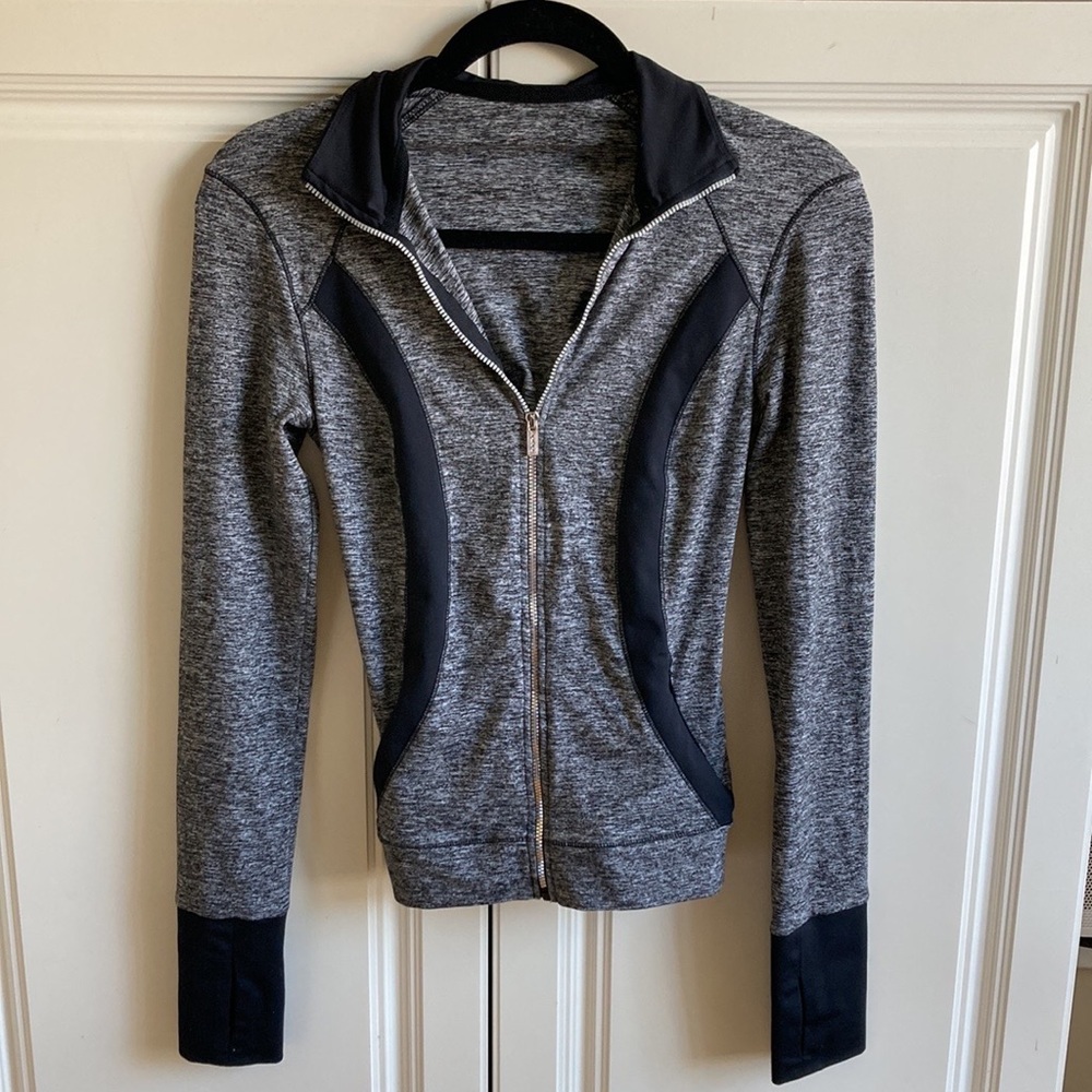 Bebe sport corset activewear zip up jacket. Corset tie back. Size small